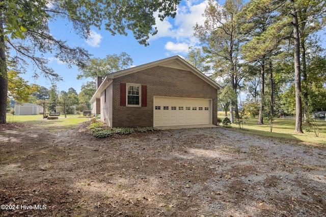 view of property exterior with a garage