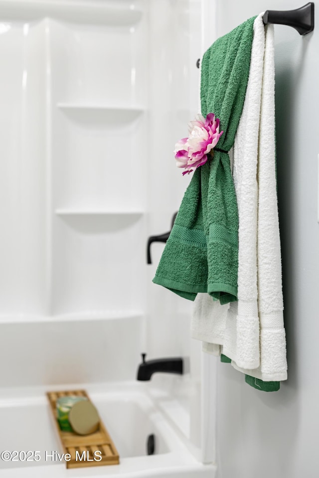 interior space featuring independent shower and bath