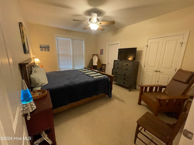 carpeted bedroom featuring ceiling fan