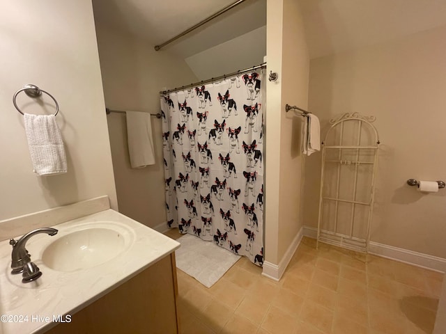 bathroom featuring vanity and walk in shower