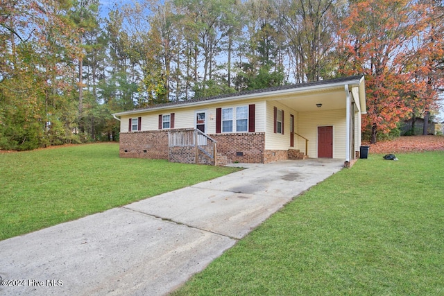 view of front of property featuring a carport and a front lawn