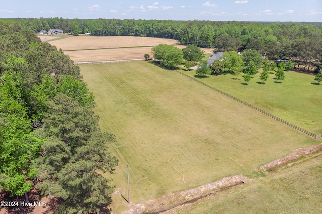 birds eye view of property featuring a rural view