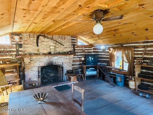 unfurnished living room with a wealth of natural light, vaulted ceiling, and wooden ceiling