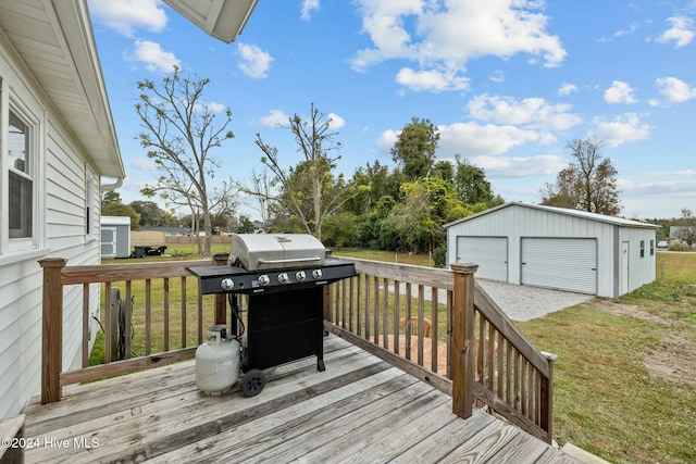 wooden terrace with a yard, a grill, an outbuilding, and a garage