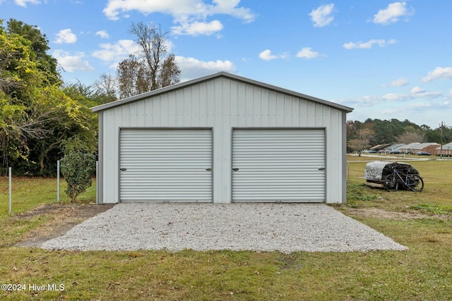 garage with a lawn