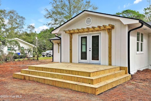 view of outbuilding with french doors