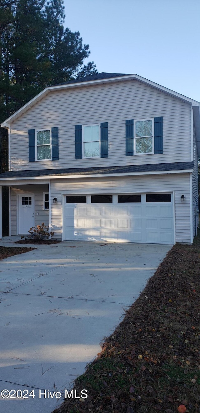 view of front property with a garage