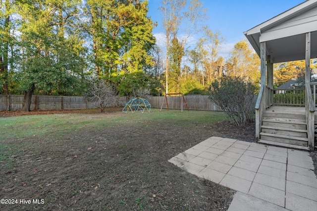 view of yard featuring a wooden deck