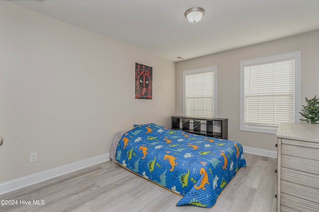 bedroom featuring light hardwood / wood-style floors