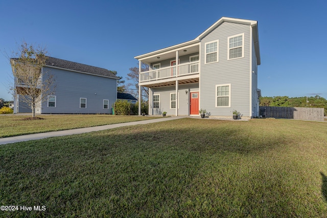 front facade with a front lawn and a balcony