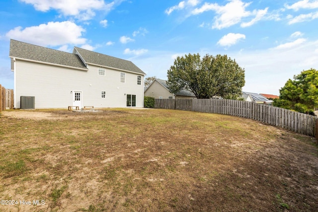 view of yard featuring central AC