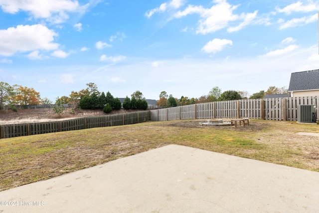 view of yard with a patio and cooling unit