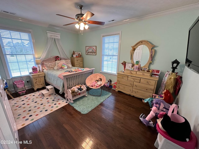 bedroom featuring ceiling fan, dark hardwood / wood-style floors, and ornamental molding