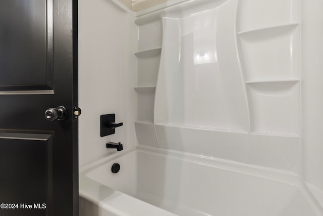 bathroom with shower / bathing tub combination