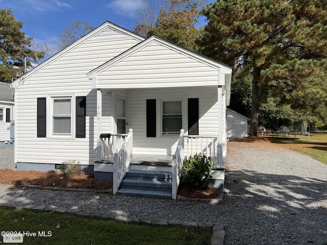 bungalow featuring covered porch