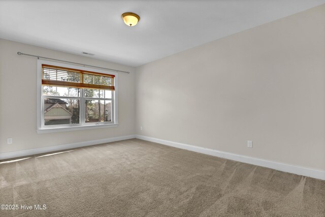 carpeted bedroom featuring ceiling fan and crown molding