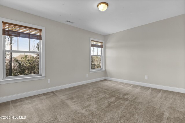 recreation room with light colored carpet and vaulted ceiling