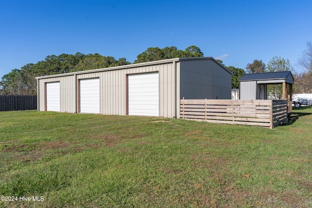 garage with a yard