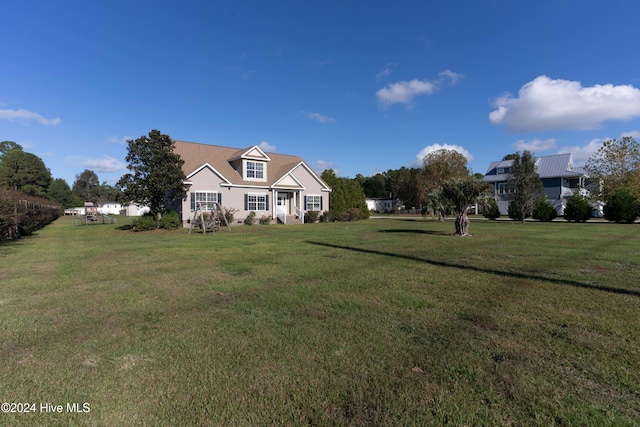 view of front of home with a front lawn