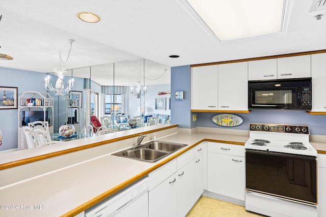 kitchen with a notable chandelier, white appliances, a sink, white cabinetry, and light countertops