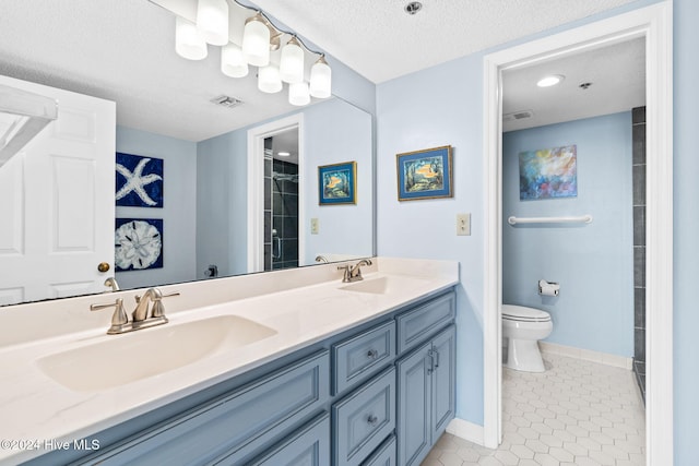 full bath with tile patterned flooring, visible vents, and a sink