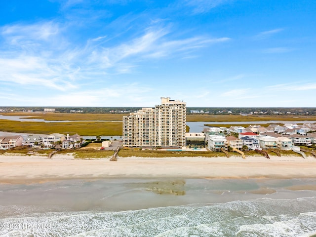 aerial view with a view of the beach and a water view