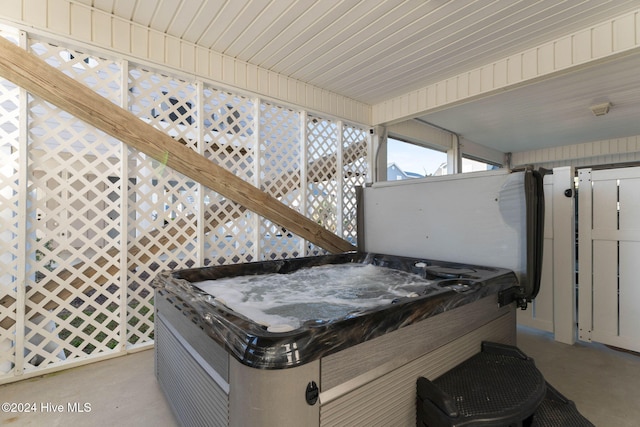 view of patio with a hot tub