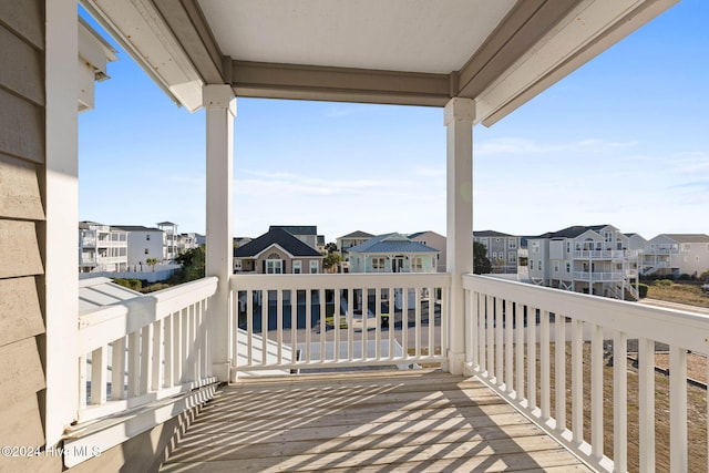 balcony featuring a residential view