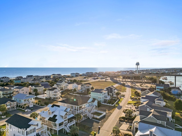 bird's eye view with a water view and a residential view