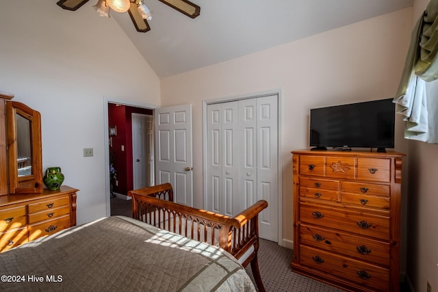 carpeted bedroom featuring ceiling fan, a closet, and high vaulted ceiling