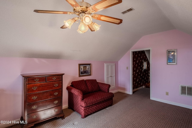 sitting room with a textured ceiling, ceiling fan, carpet, and lofted ceiling