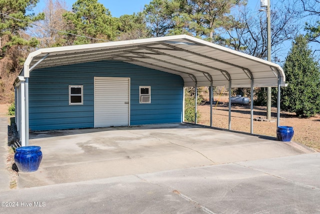 view of parking / parking lot featuring a carport