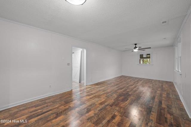 unfurnished room featuring ceiling fan, dark hardwood / wood-style flooring, and a textured ceiling