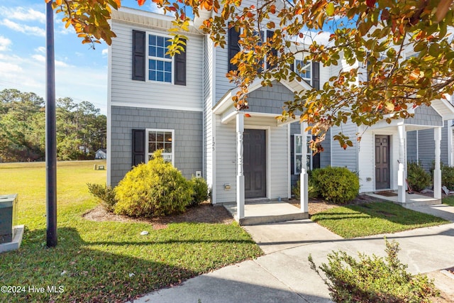 view of front of house with a front yard