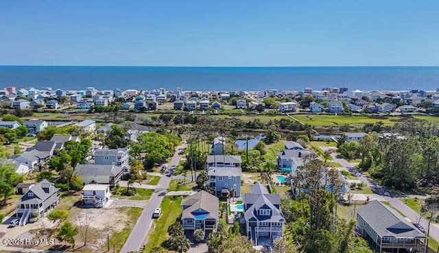 3207 E Oak Island Dr, Oak Island, NC 28465 - aerial view of residential area with a nearby body of water