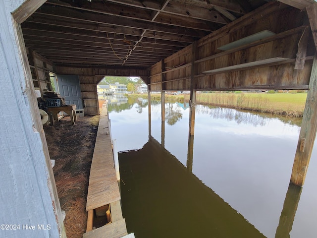 view of dock with a water view