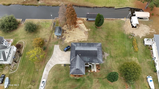 birds eye view of property featuring a water view