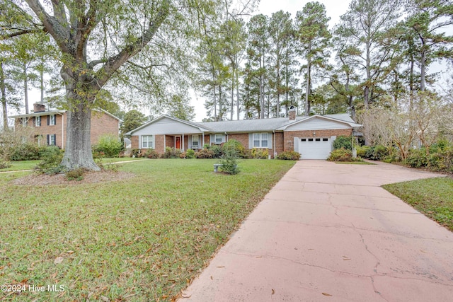 ranch-style house with a front yard and a garage