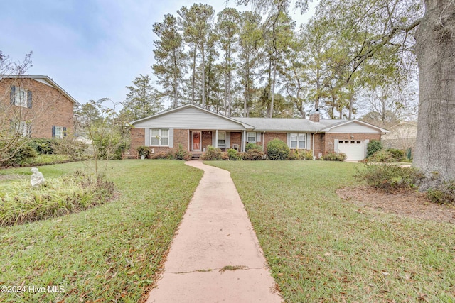 ranch-style home featuring a garage and a front lawn