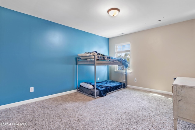 unfurnished bedroom featuring carpet flooring