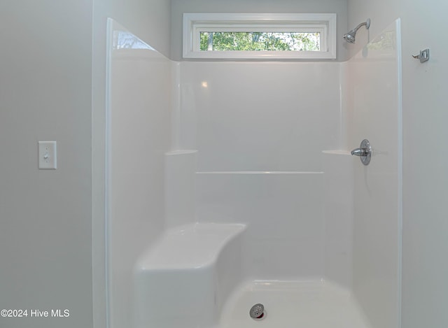 bathroom with walk in shower