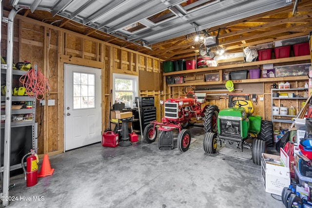 garage with a workshop area