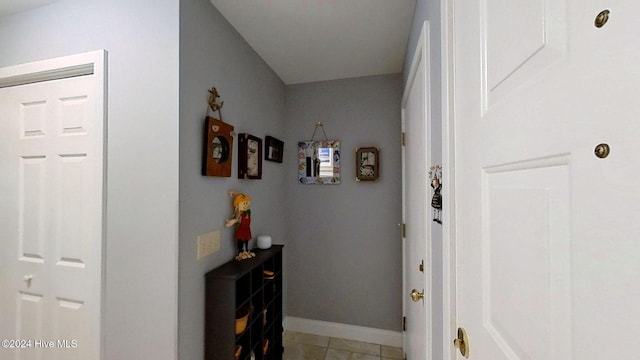 hall featuring tile patterned floors