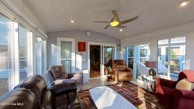 sunroom with lofted ceiling, wooden ceiling, and ceiling fan