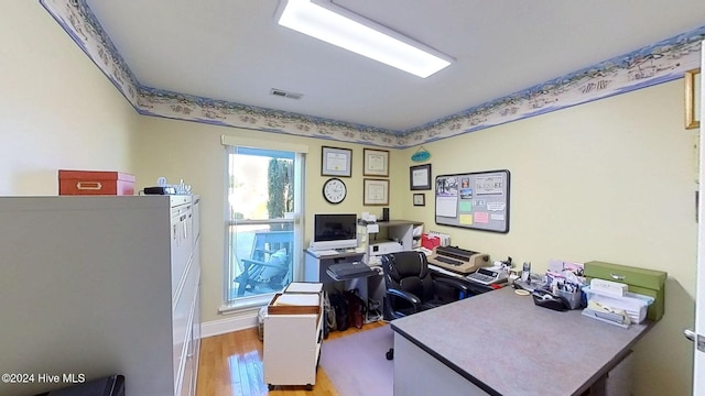 office area featuring light hardwood / wood-style floors