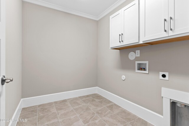 laundry room featuring hookup for an electric dryer, hookup for a washing machine, cabinets, crown molding, and hookup for a gas dryer