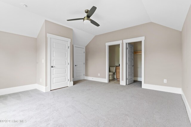 bonus room featuring ceiling fan, light colored carpet, and vaulted ceiling