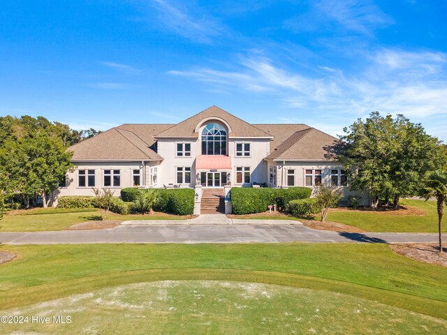 view of front of house with a front yard