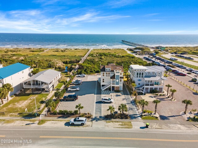 bird's eye view featuring a water view and a view of the beach