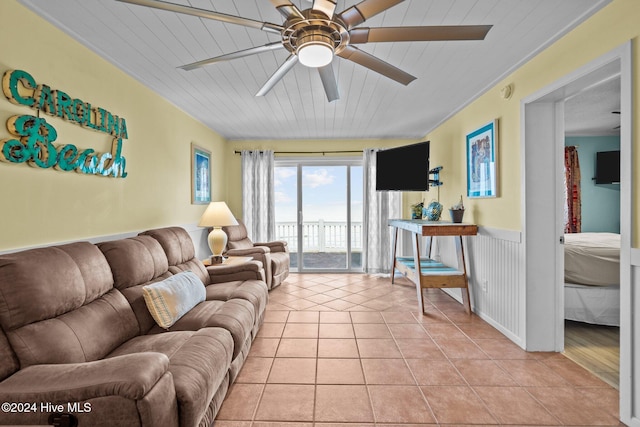 living room featuring light tile patterned floors, ceiling fan, and wooden ceiling